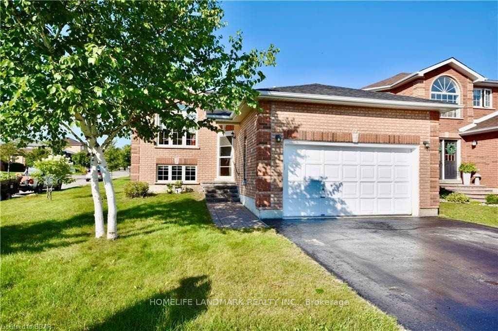All Brick Raised Bungalow In Little Lake Area, Main Floor Offers 3 Bedrooms, Two Full Bathrooms, Living Room And Dining Room Combined.