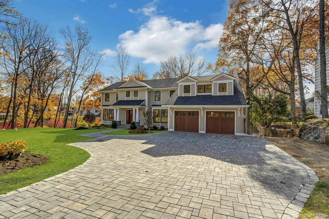 Welcome to 32 Sycamore Road an exceptional new construction set on over half an acre in the heart of Scarsdale.