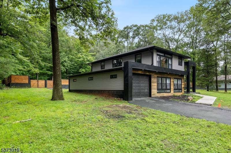 Welcome to 65 Old Stirling Rd, a newly built modern residence in the heart of Warren Township, completed less than a year ago.