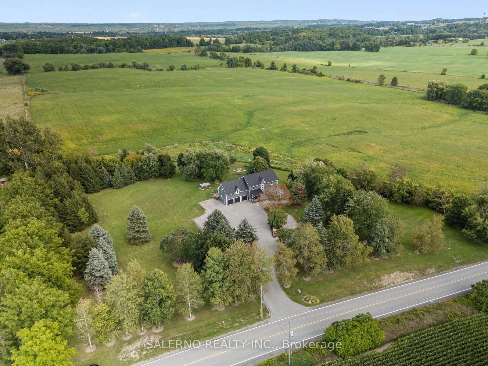 Welcome to 16455 10th Concession, King Schomberg where country living meets modern convenience.