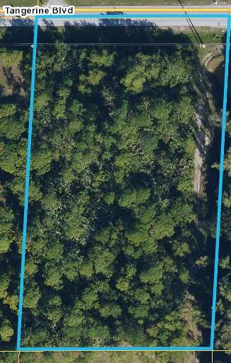 This undeveloped lot presents a unique opportunity to create a personalized living space in a tranquil, rural setting while still being conveniently close to urban amenities.