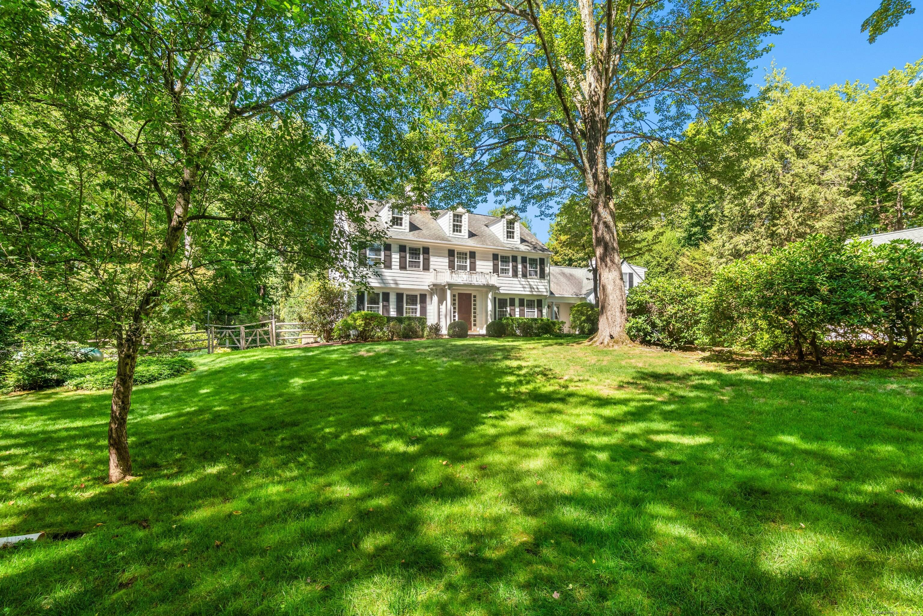 Situated on over two acres on one of New Canaan's most coveted cul de sacs, this five bedroom Colonial offers gracious living in a serene west side setting.