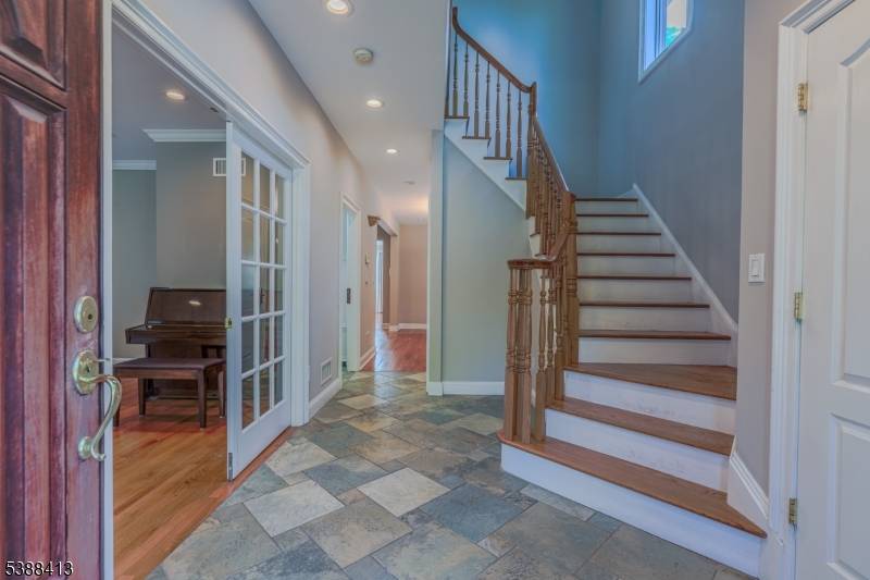 Welcome to this stunning fully renovated 5 bedroom home in the heart of Springfield, NJ, just steps from the legendary Baltusrol Golf Course.