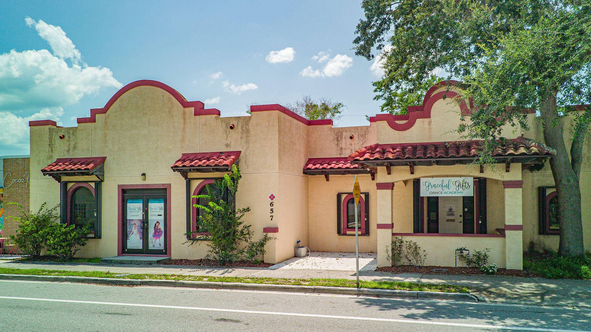 This is a rare opportunity to own one of the beautiful Spanish style commercial buildings in Historic Cocoa Village.