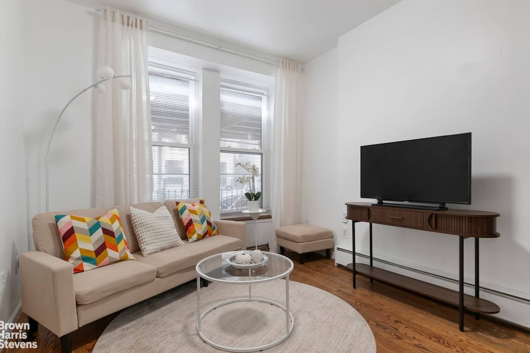 Experience the luxury of two story living in this meticulously renovated 1 bedroom, 1.