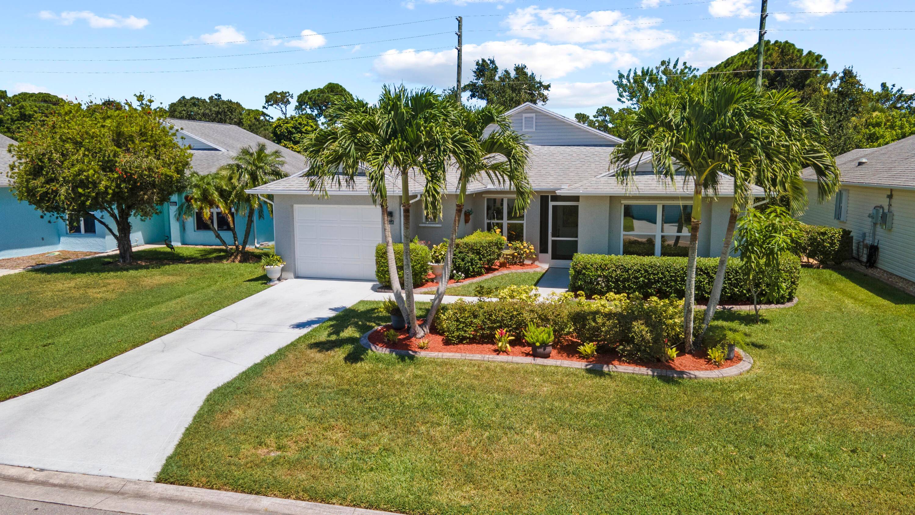 Welcome to Palm Grove ! Updated 2 bedroom, 2 bath home offers a bright, open layout with spacious living and dining areas.