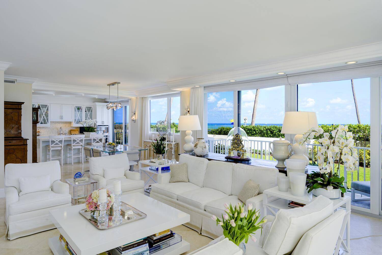 Rare, first floor condo with 3 3 1 2 baths with stunning direct ocean views.