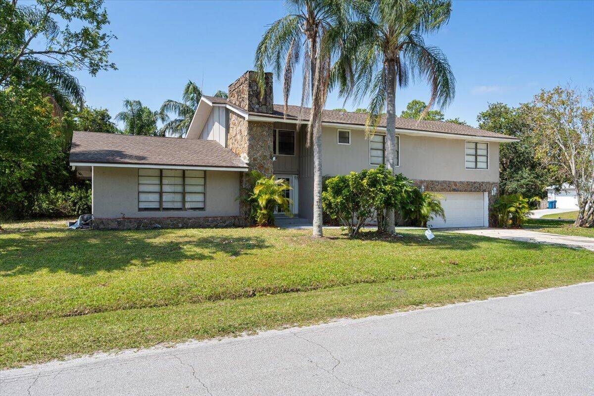 Spacious and remodeled 4 bedroom, 3 bath home with bonus dens, offering 2, 942 sqft of living space on a generous corner 0.