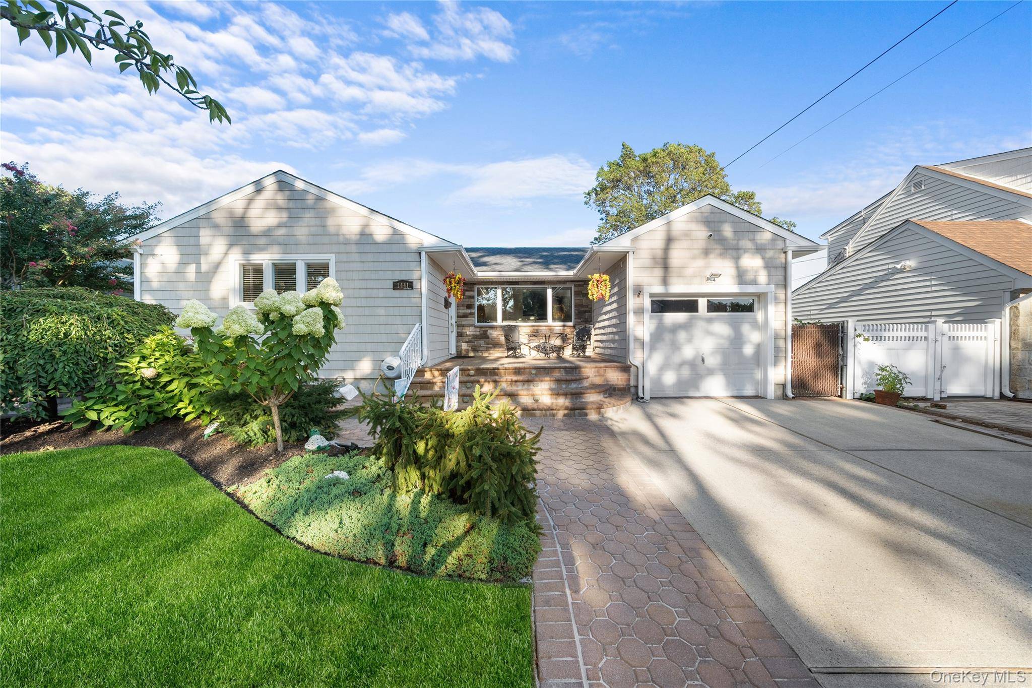 Experience modern luxury in this fully renovated expanded ranch, offering 3 bedrooms and 2 bathrooms.