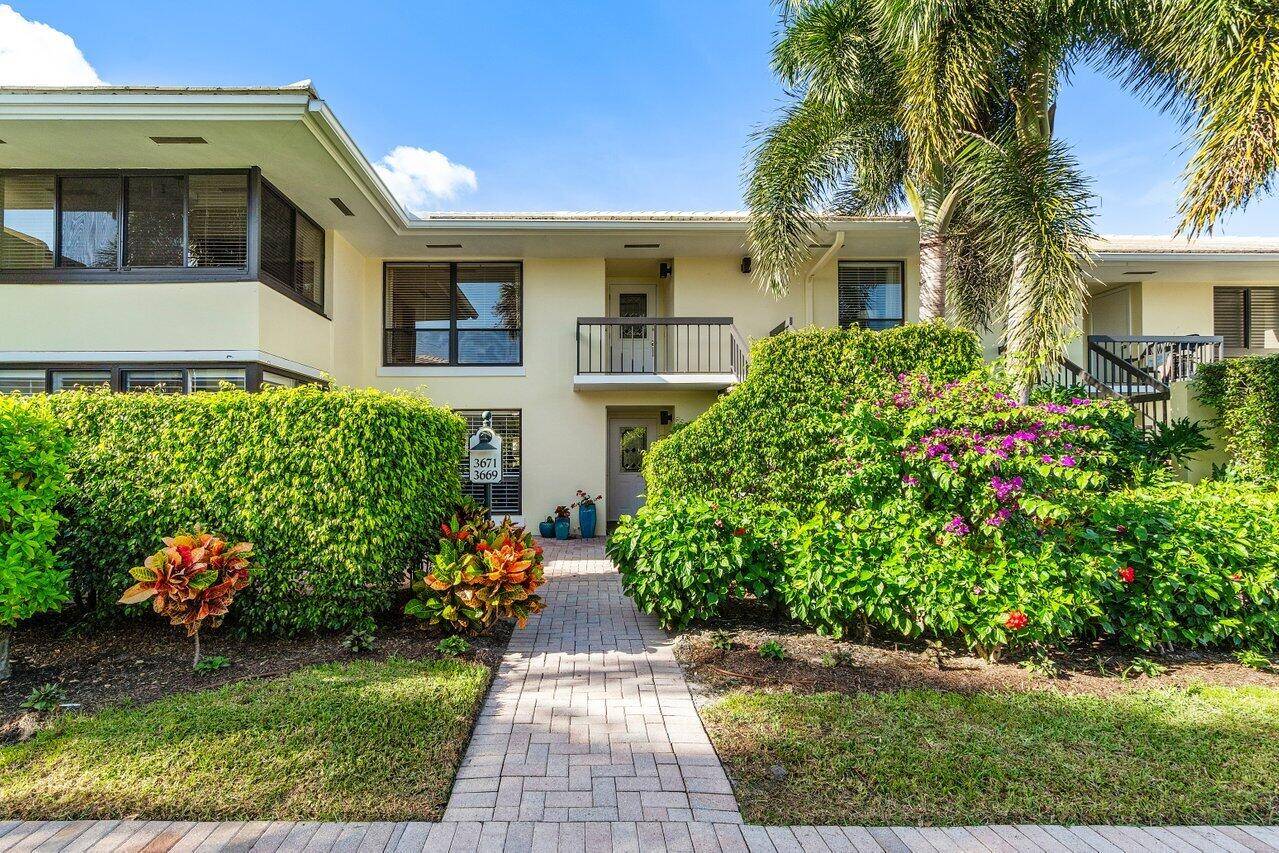 Gorgeous golf, lake and garden views from this second floor residence.