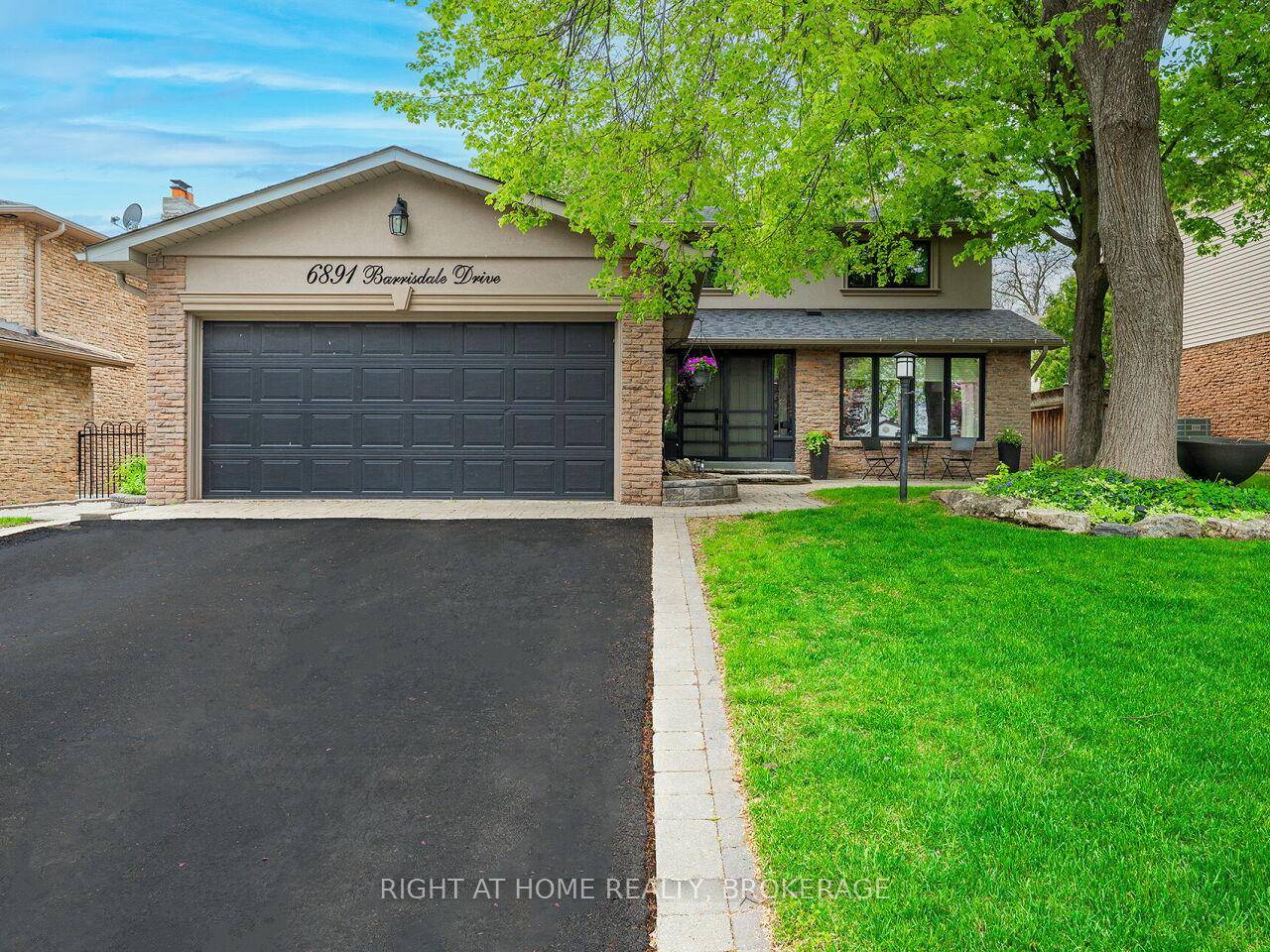 Welcome to this exceptional, fully renovated home located on one of Meadowvale's most desirable and prestigious streets.