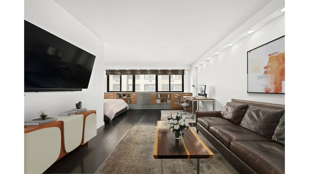 Impeccably maintained and oversized alcove studio available for rent at Chelsea Lane in Flatiron.