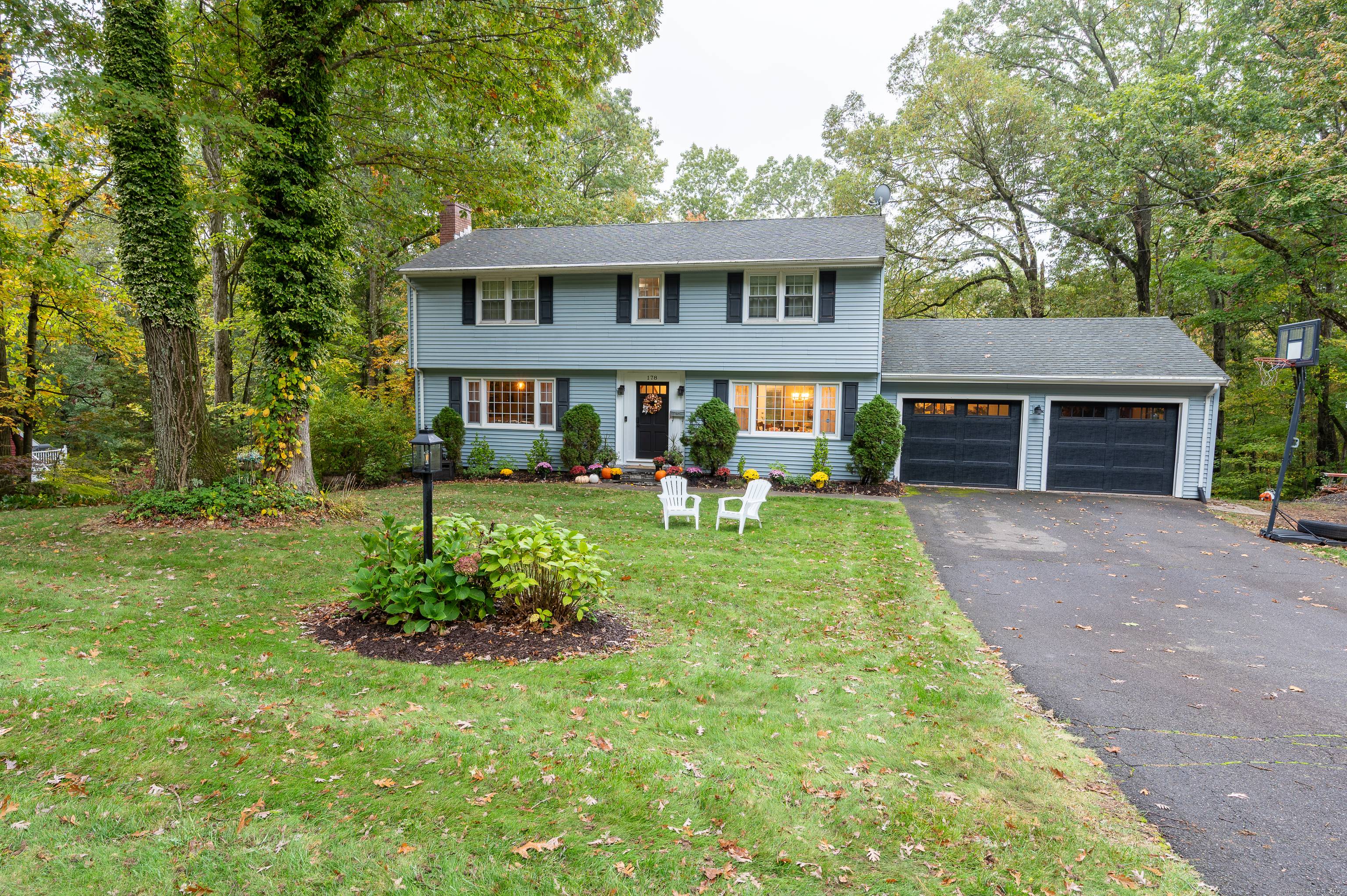 Attractive 4 bedroom colonial in residential setting within walking distance to the elementary and middle schools.