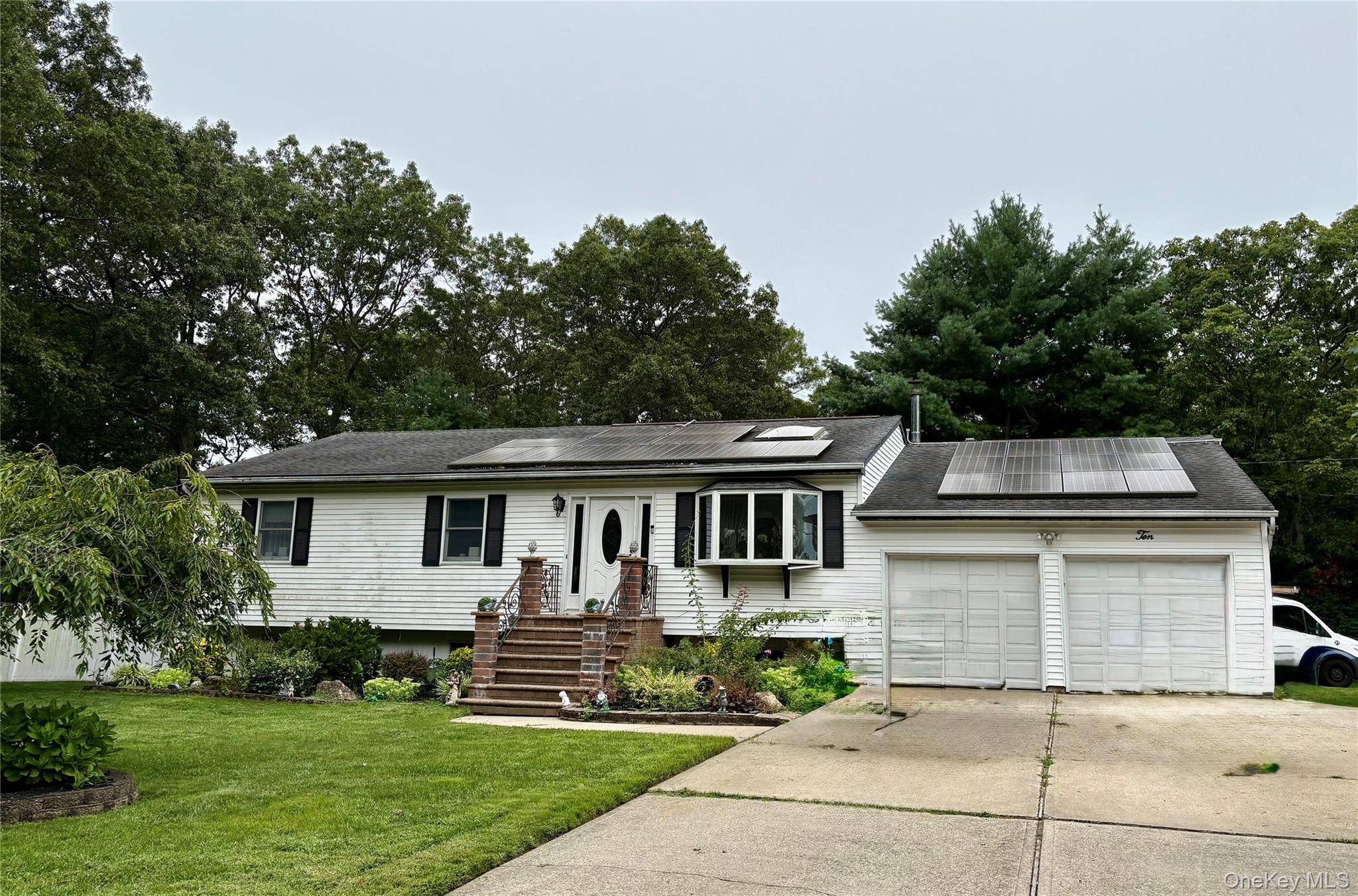 Spacious five bedroom, three full bath, raised ranch features an updated kitchen with a large island and granite countertops, stainless steal appliances, sliders off the kitchen that lead to a ...