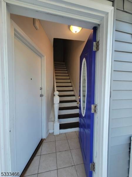 THIS 2 FAMILY DWELLING OFFERS A TOTAL OF 6 BEDROOMS, 3 BATHS AND PARTIALLY FINISHED BASEMENT.