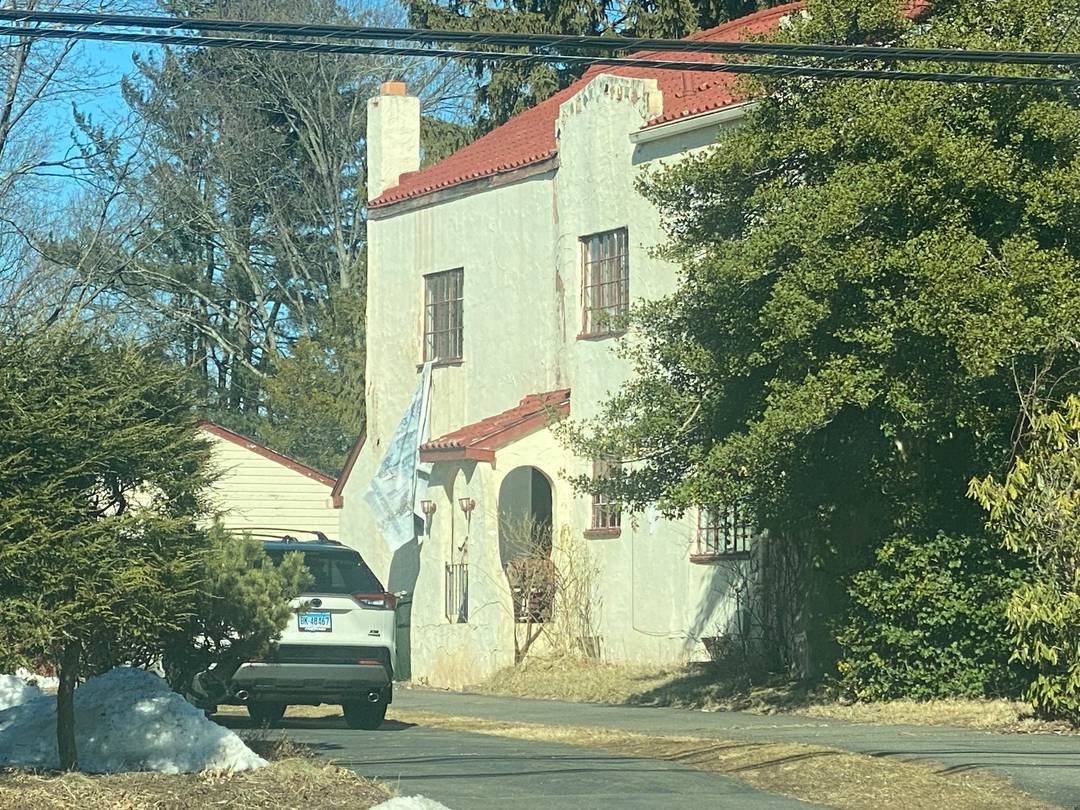 This is a Colonial Style Home near West Hartford center that has 4 bedrooms, 3.