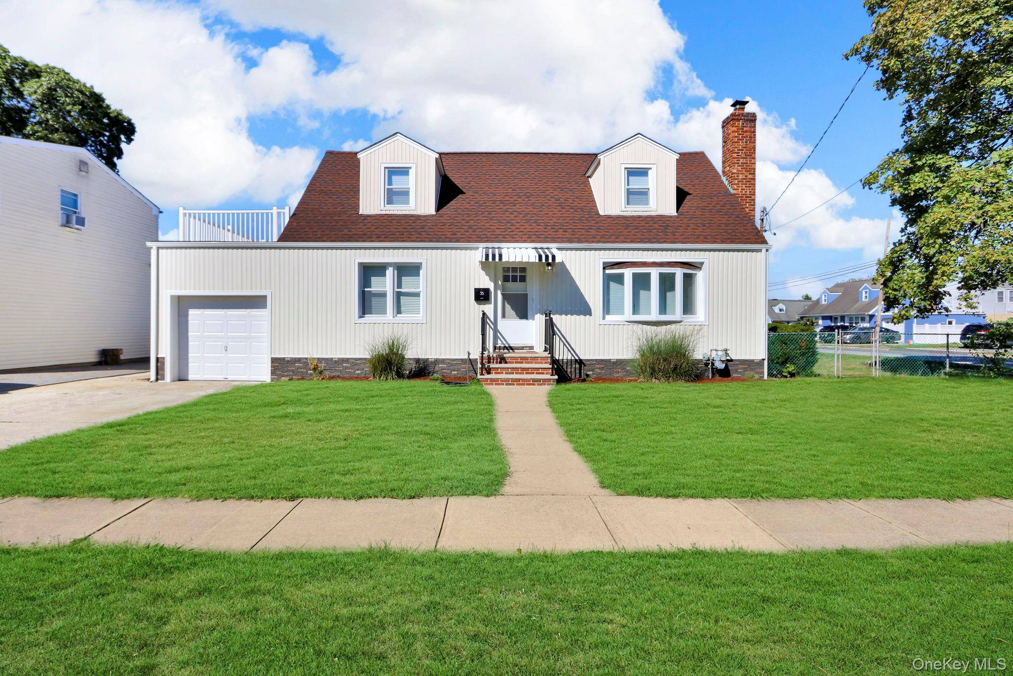 This charming single family home is nestled in the heart of Nassau County.
