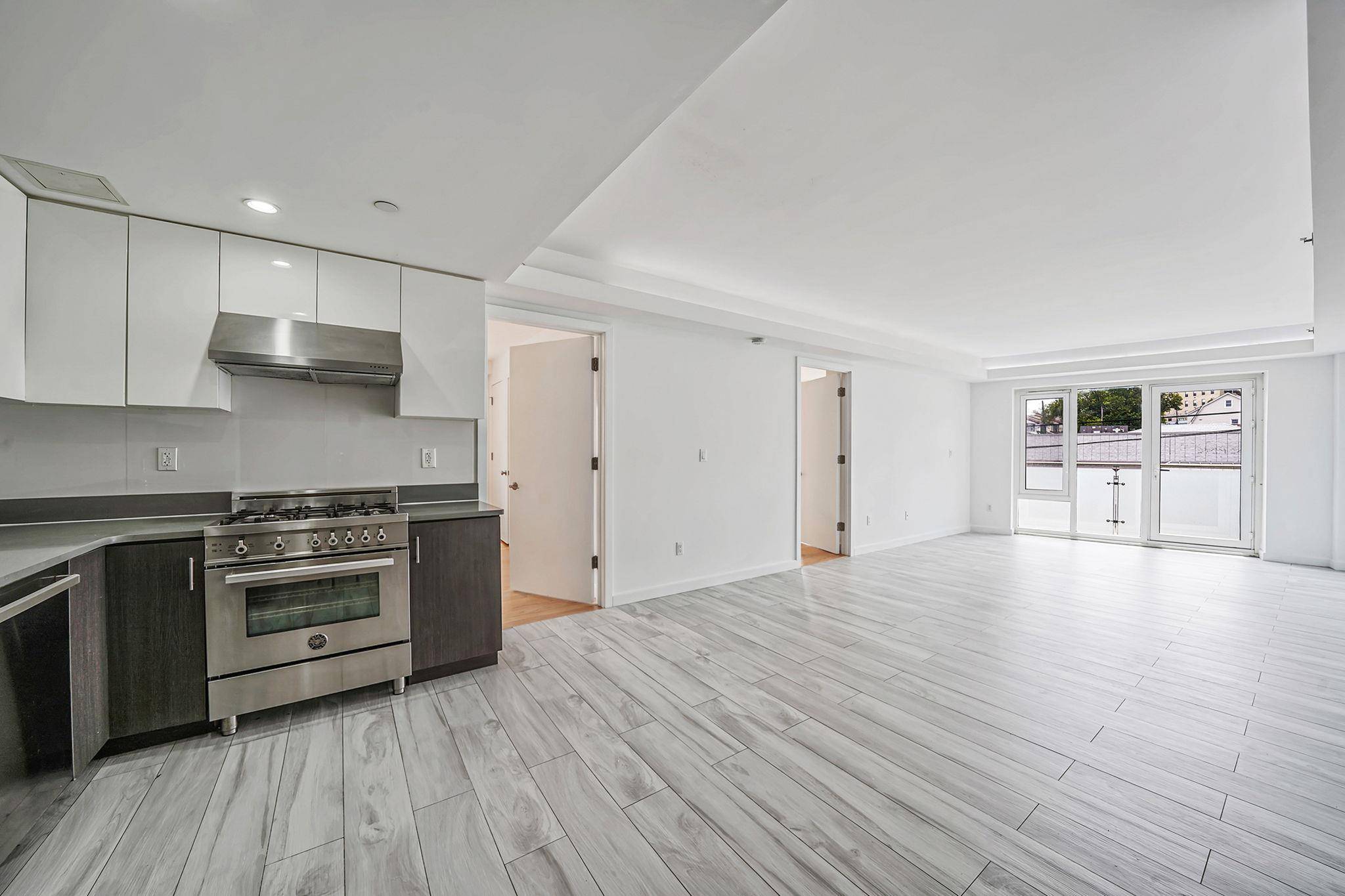 Welcome to this modern 2 bedroom, 2 bathroom condo in the heart of Fresh Meadows, built in 2017.