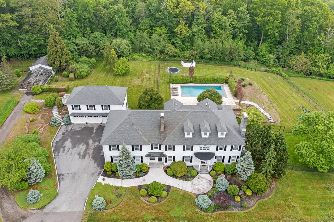 Come see this remarkably private property a stone's throw from the center of Litchfield.