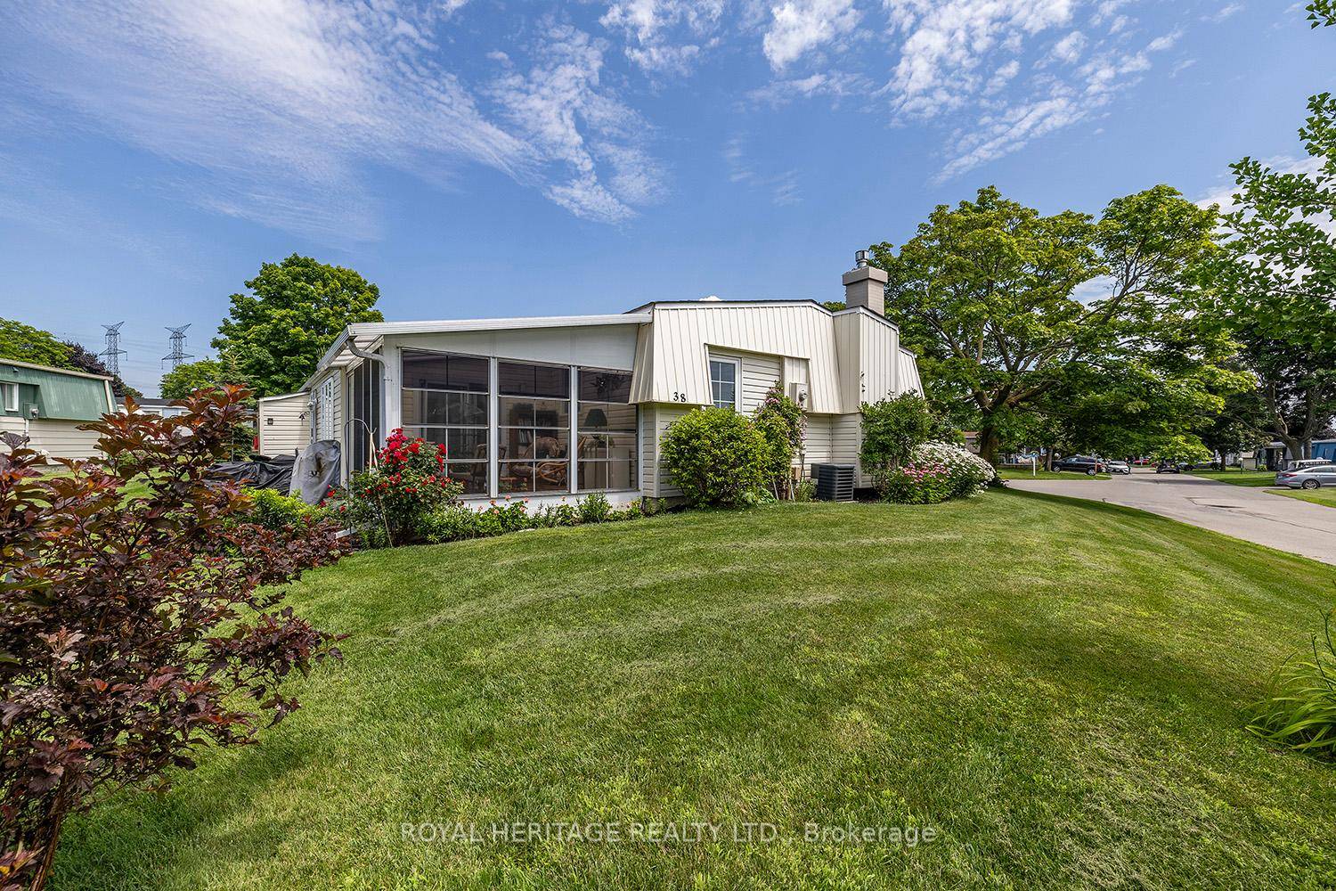 Nestled along the tranquil shores of Lake Ontario in the sought after Wilmot Creek community, this charming 2 bedroom bungalow offers a rare blend of waterfront living, privacy, and space.