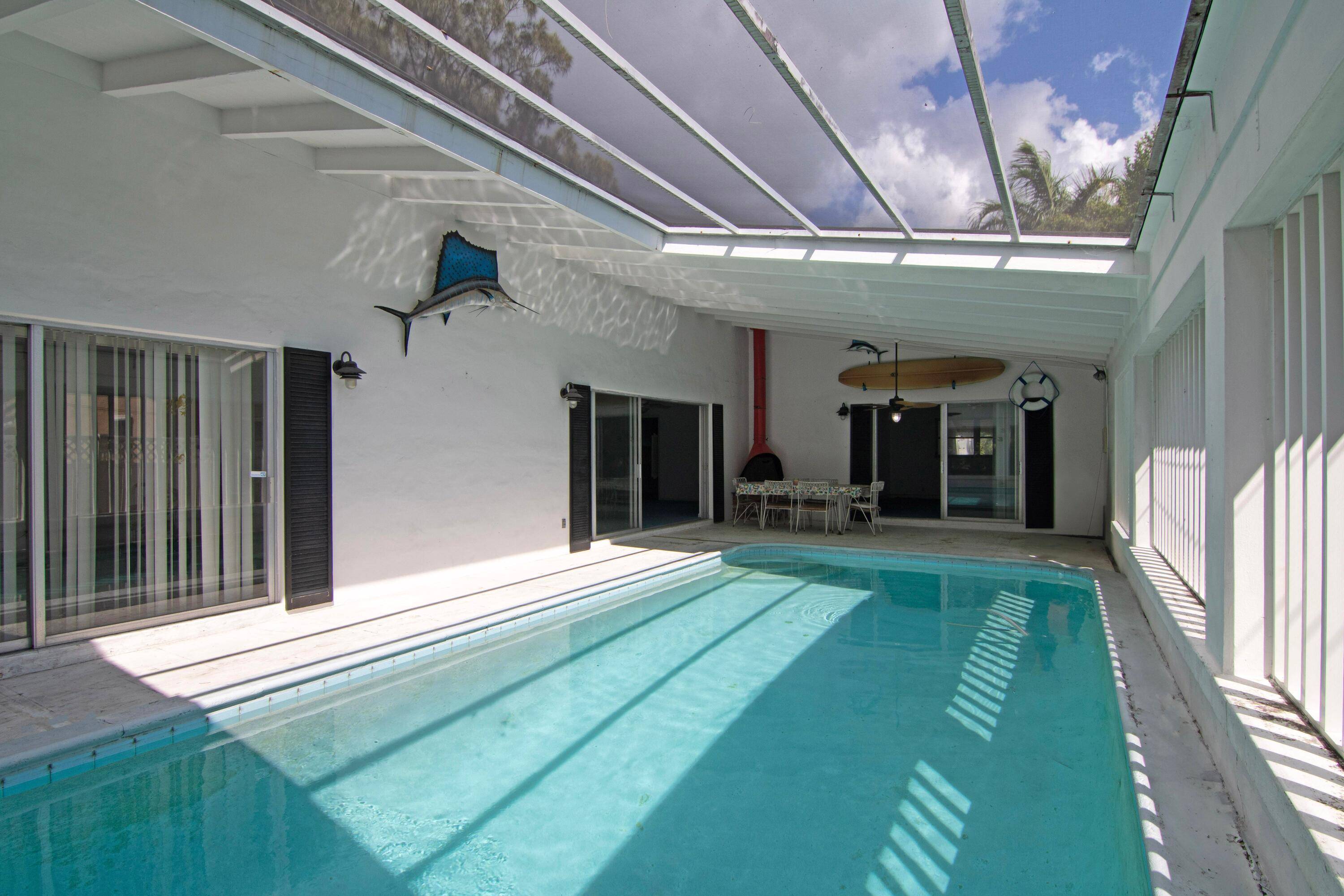This Pool Home has 3 Bedrooms, Office, 2 Full Baths and a 1 car garage that can be converted back to a 2 car garage.