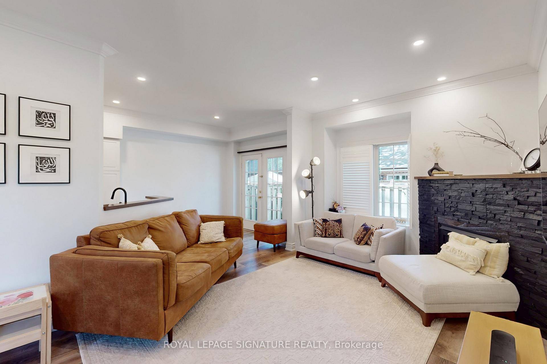 Welcome to this beautifully maintained 2 bedroom, 4 bathroom executive end unit townhome in Burlington's highly sought after Maple District.