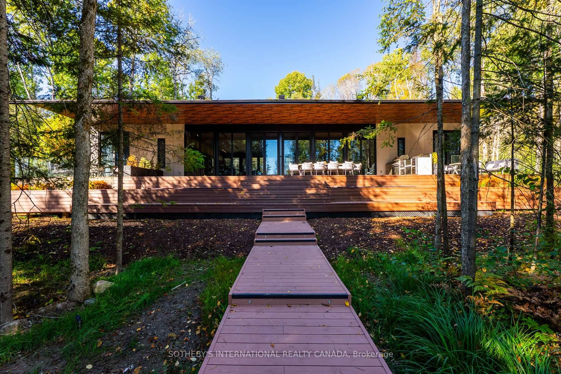 Discover your own private waterfront sanctuary on Jack amp ; Pickerel Lake with this Modern 8 bedroom, 6 bathroom lakefront estate offering on a 6 acres level lot with 208ft ...