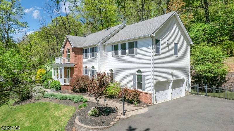 Experience timeless elegance and modern comfort in this exceptional colonial, offering spectacular views, unmatched tranquility, and total privacy all just minutes from top rated schools, shopping, major highways, and public ...