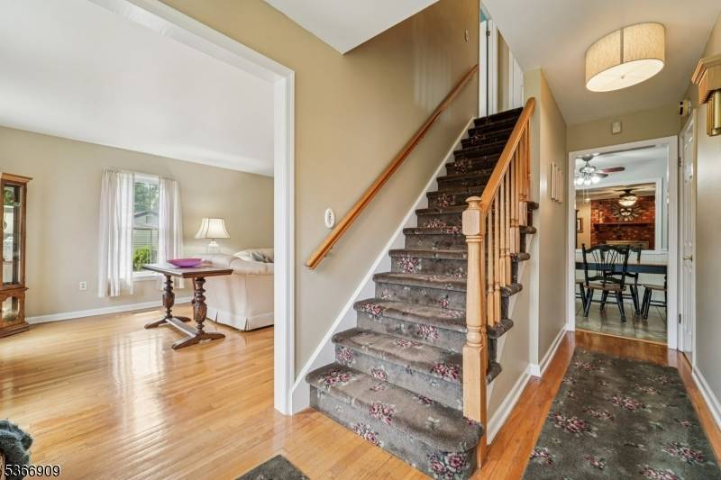 Meticulously maintained four bedroom three and a half bath colonial on a private level lot on a cul de sac !