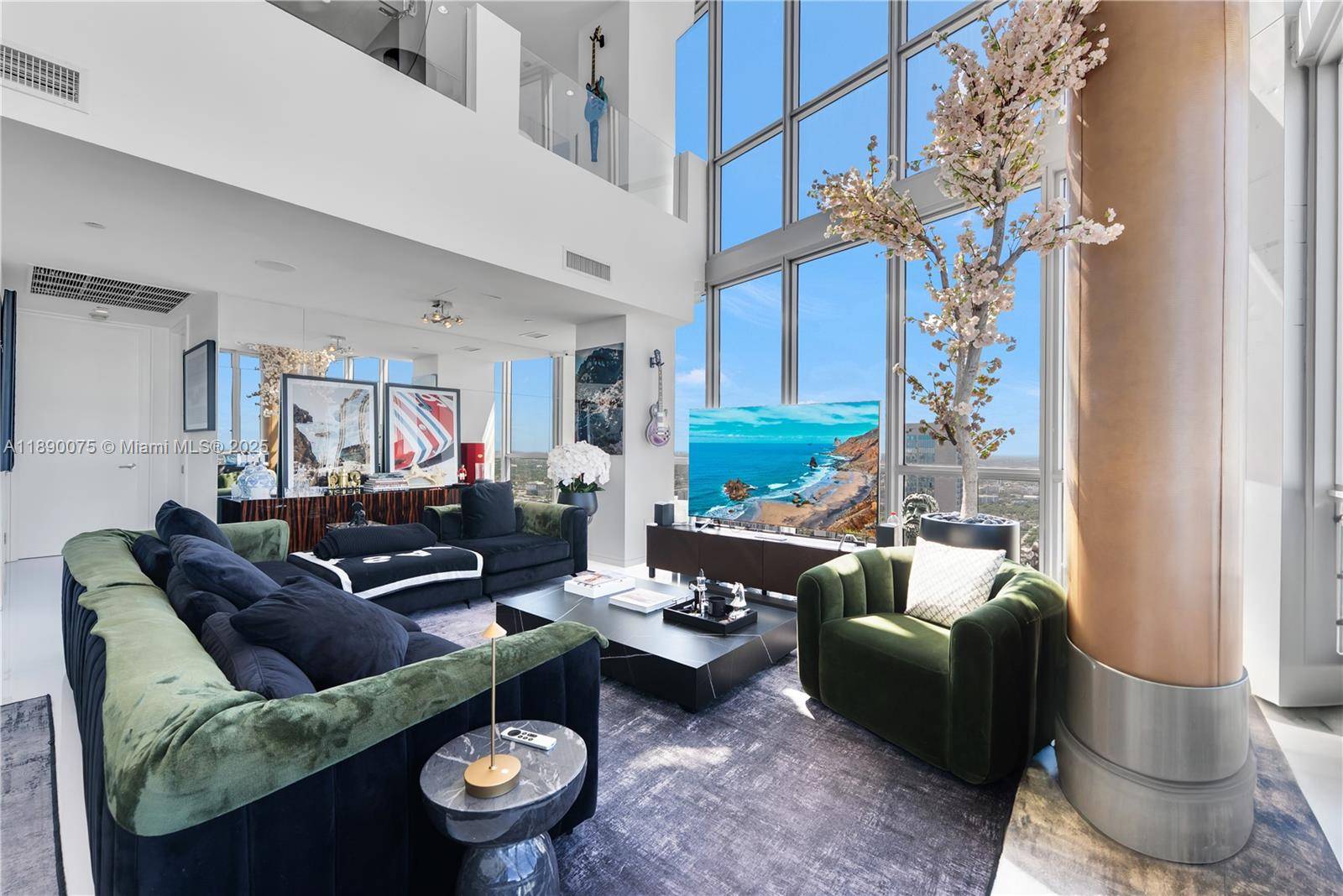 Soaring 63 floors above Downtown Miami in the Marquis, this 2 story penthouse offers 270 views of Biscayne Bay, the ocean, and city skyline.