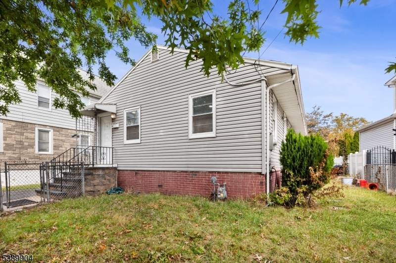 Discover the perfect blend of comfort and convenience in this charming home, ideally located just a short walk from Elmora Avenue and the beautiful Warinanco Park.