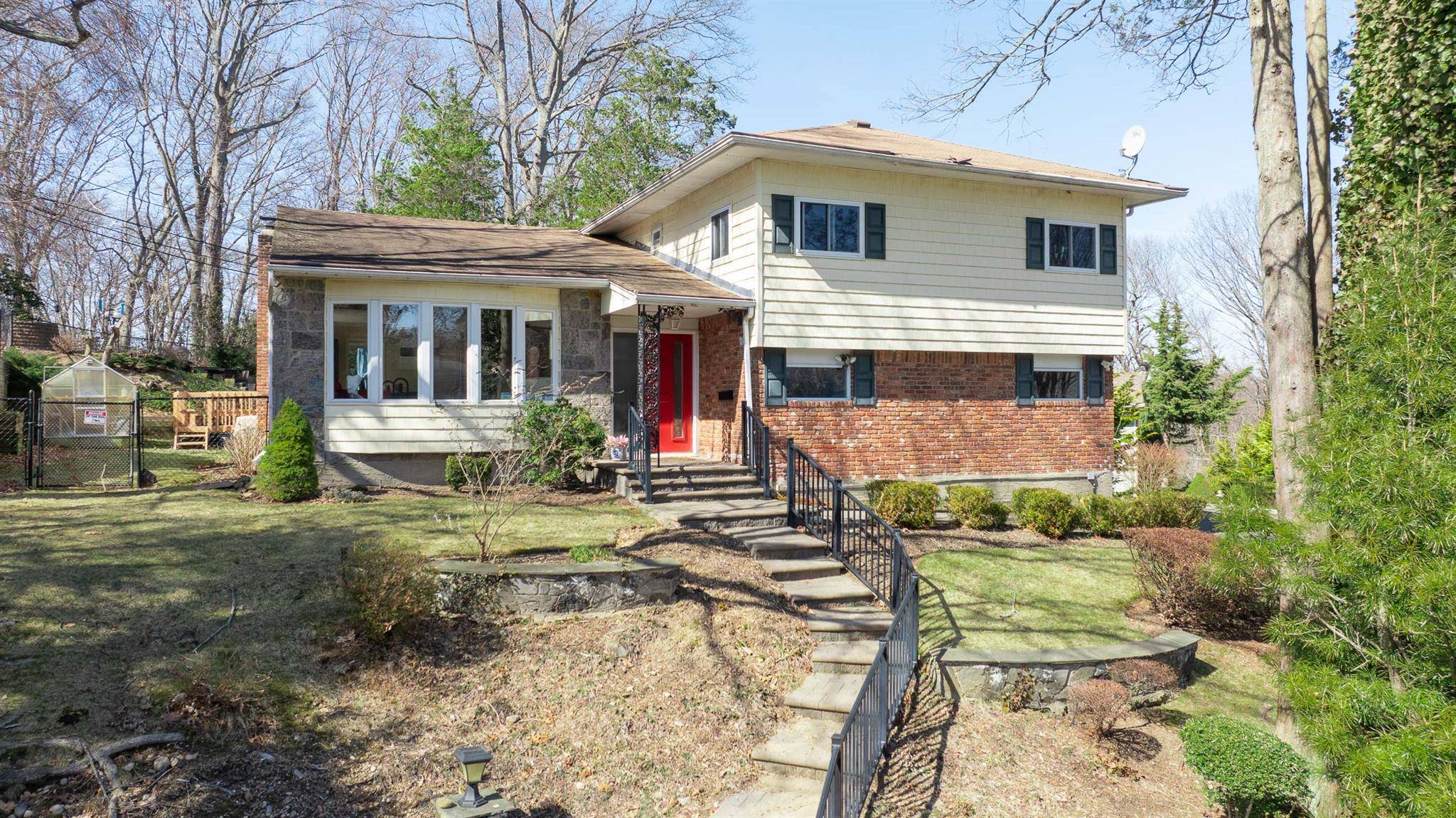 Large Private Split on Oversized Corner Property in Forest Estate Pool Community.