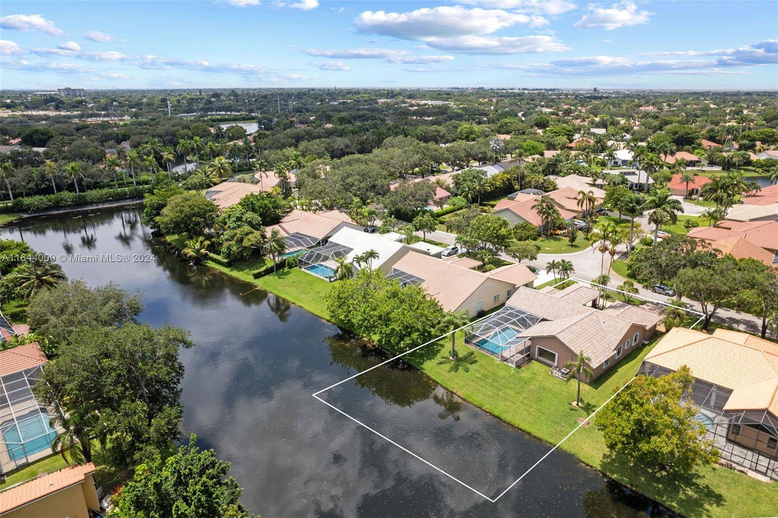Enjoy serene water and pool views from all the living areas in this spacious 4 bedroom, 3 bathroom home with a 2 car garage.