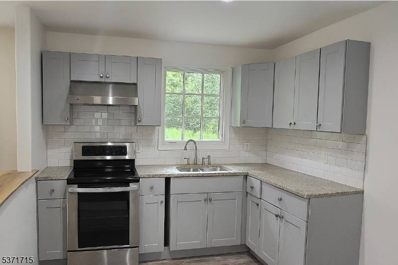 Beautifully remodeled bi level home in the heart of Wharton, just minutes from downtown Dover and public transportation.