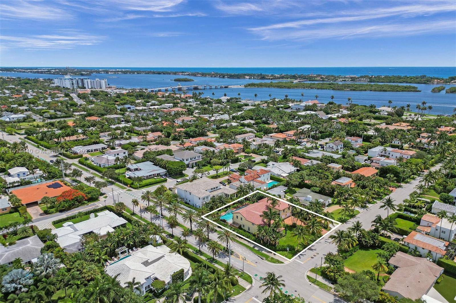 2 story Mediterranean Estate corner pool home features a 5 bedroom, 4.