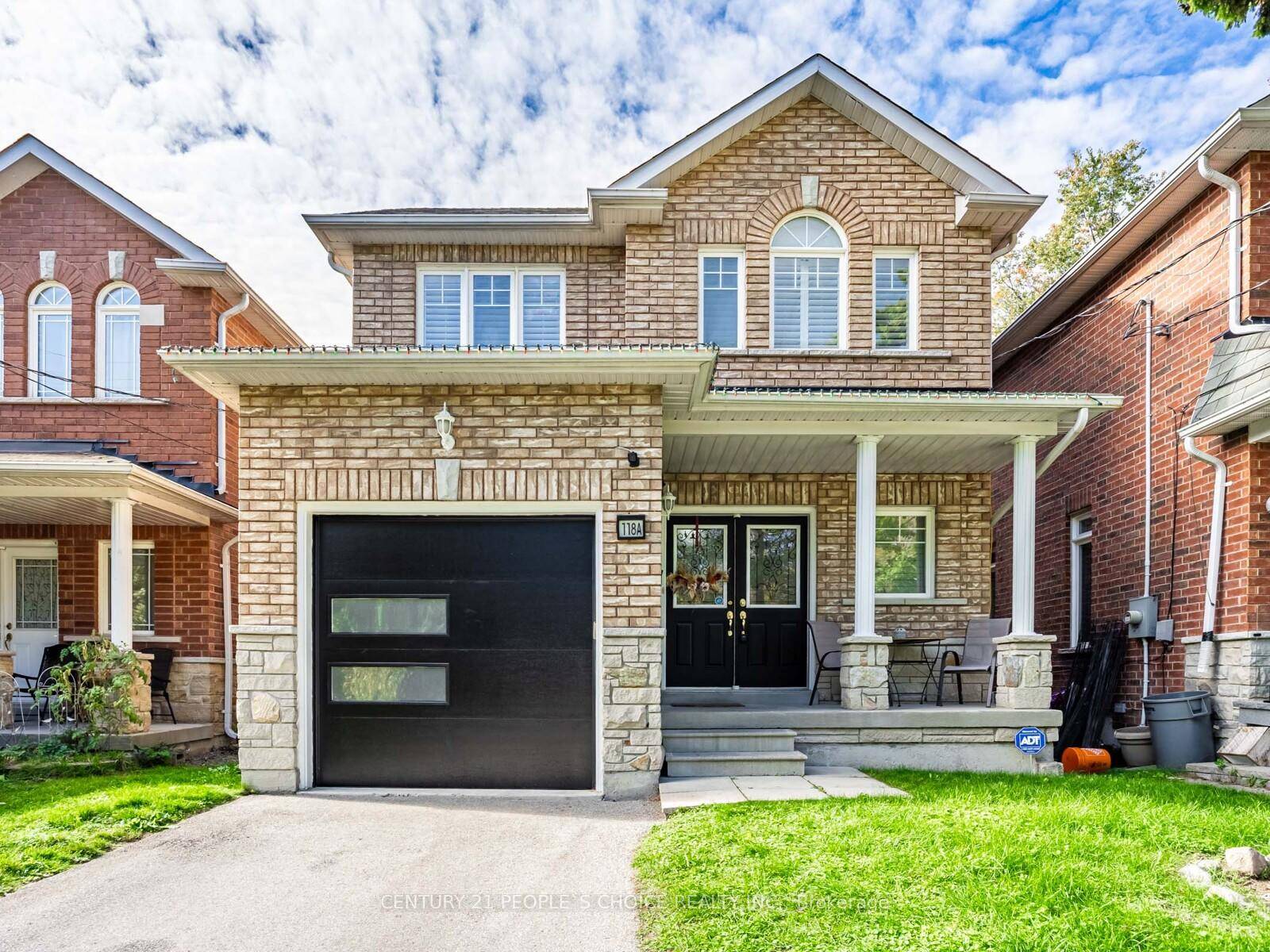 Welcome to this stunning detached all brick stone home, offering exceptional curb appeal and modern comfort.