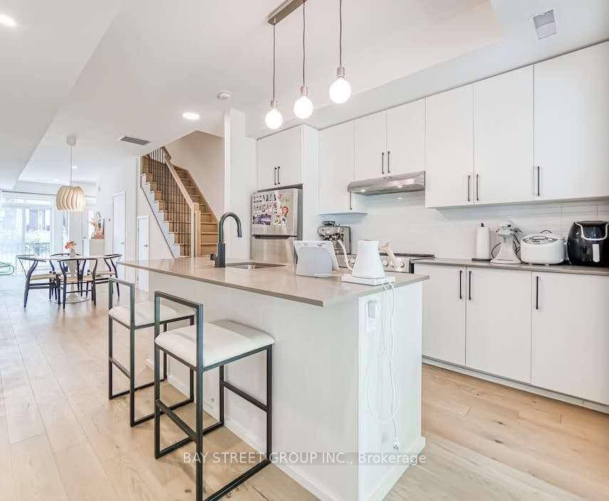 Step Into This Rare 3 Bedroom, 4 Bath Townhome In The Sought After Jackson Towns Community Developed By Daniels.