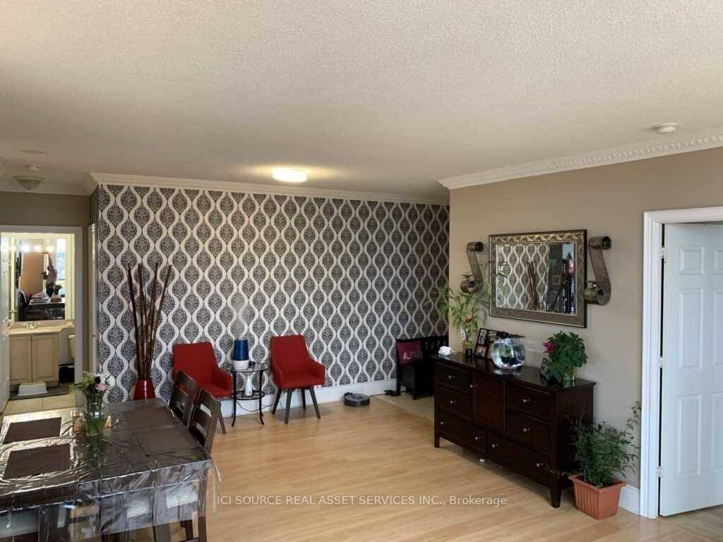Luxury corner sub penthouse in the Essex Tridel building boasts 1225 sq ft of bright living space with unobstructed Etobicoke views.