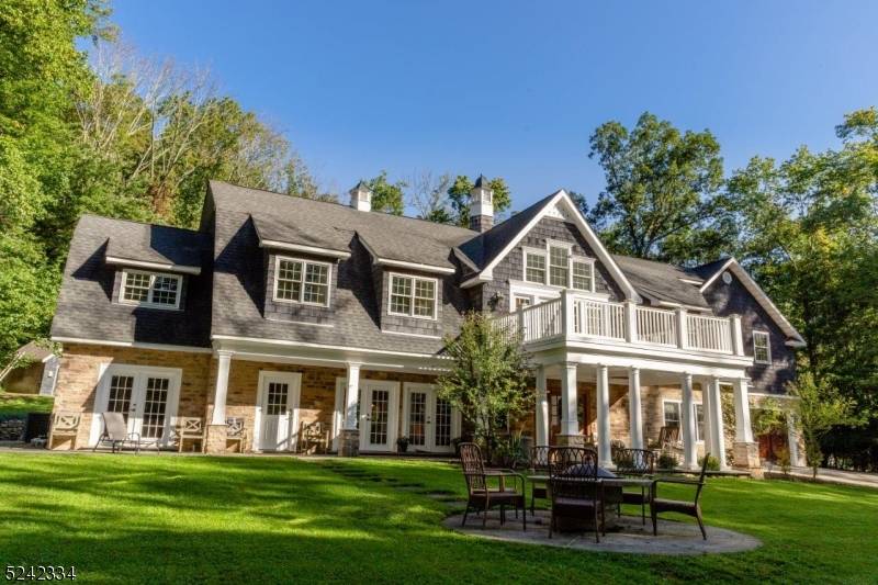 Absolutely magnificent shingle style Custom home offers 5, 000 sq ft of elegant living with top to bottom renovation in 2015 and presents like a new home boasting 12 rooms, ...