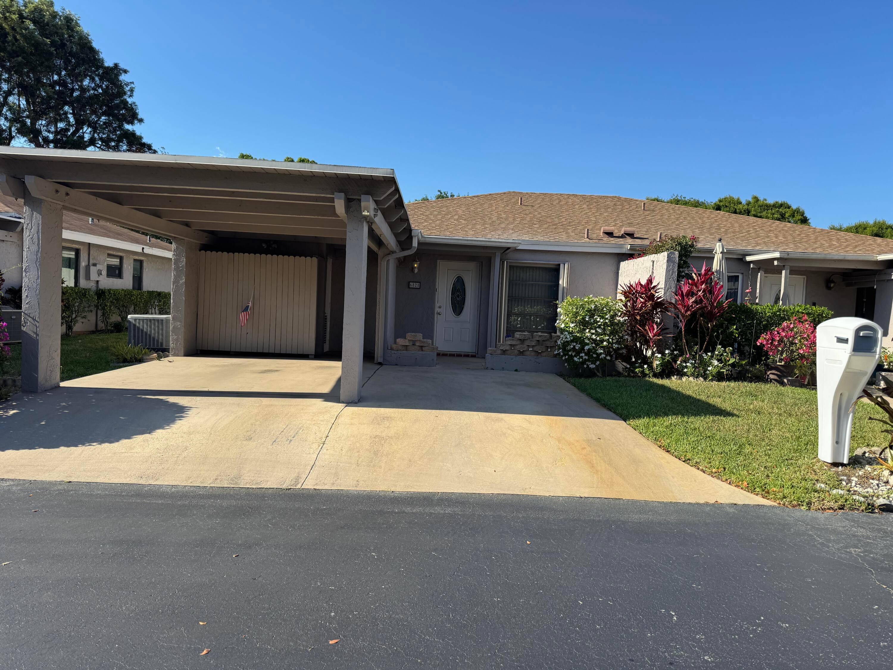 3 2 den with a 2 car driveway and carport solid cbs construction.