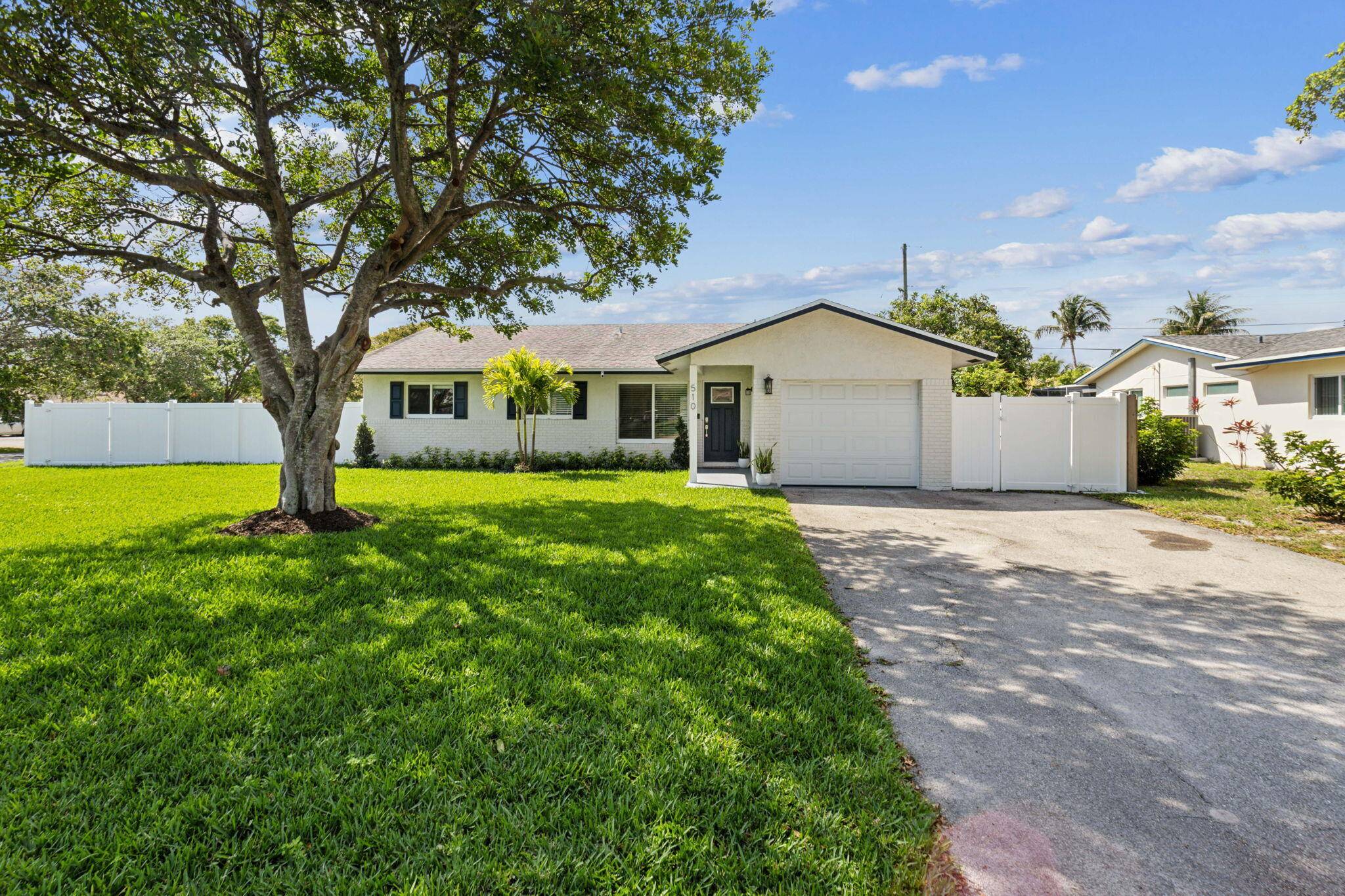 Welcome to this beautifully renovated single family home in the heart of Delray Beach, ideally positioned on a rare 9, 400 sq ft corner lot with no HOA.