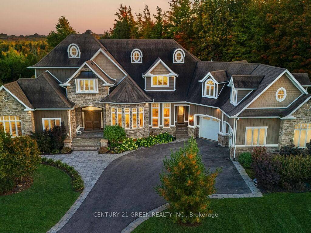 Welcome to 39 Brookhaven Crescent, where timeless craftsmanship meets modern luxury on a stunning 1.