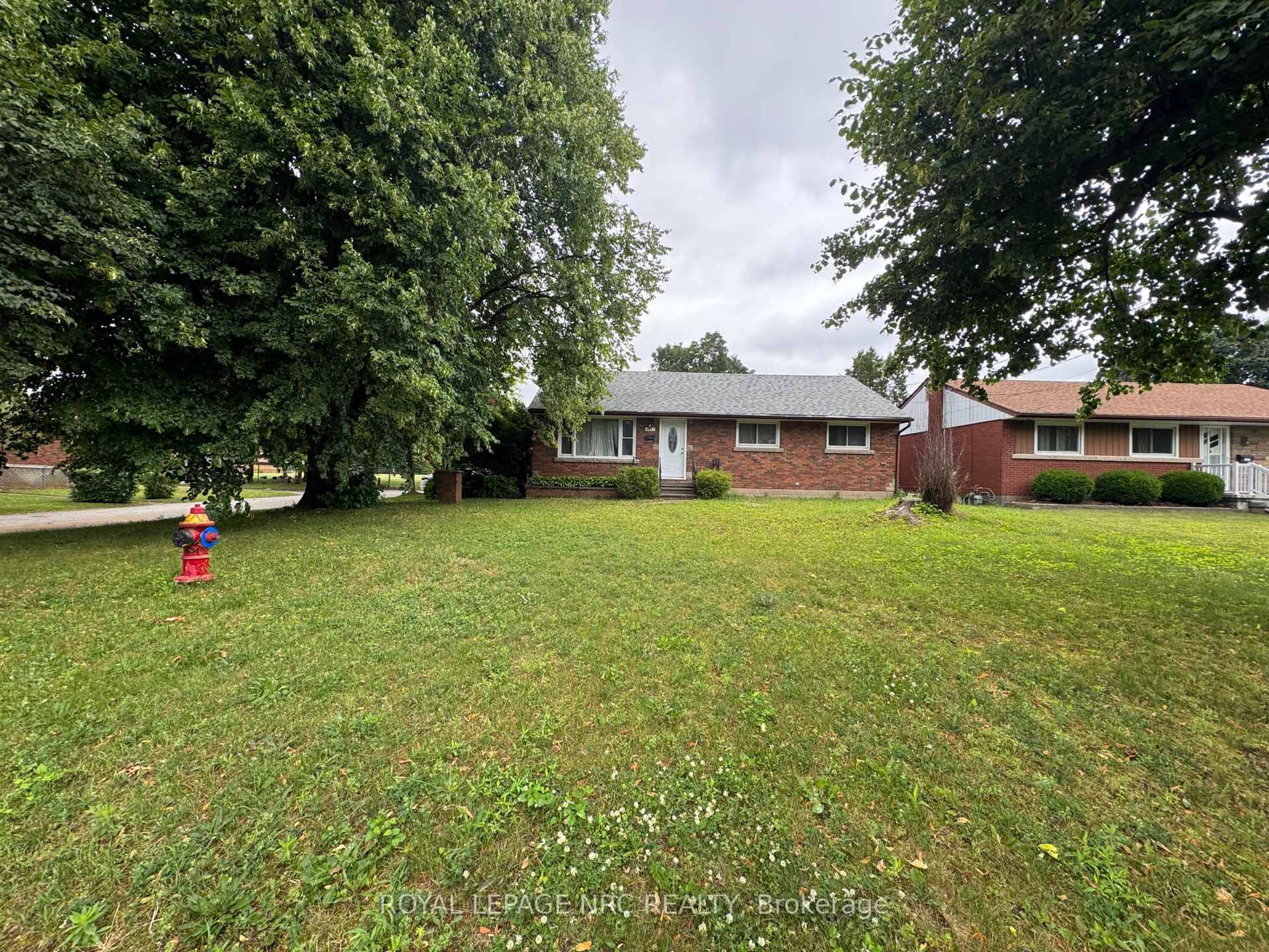 Welcome to this beautifully renovated 5 bedroom home, perfectly situated on a spacious lot with no backyard neighbors and backing directly onto a quiet schoolyard.
