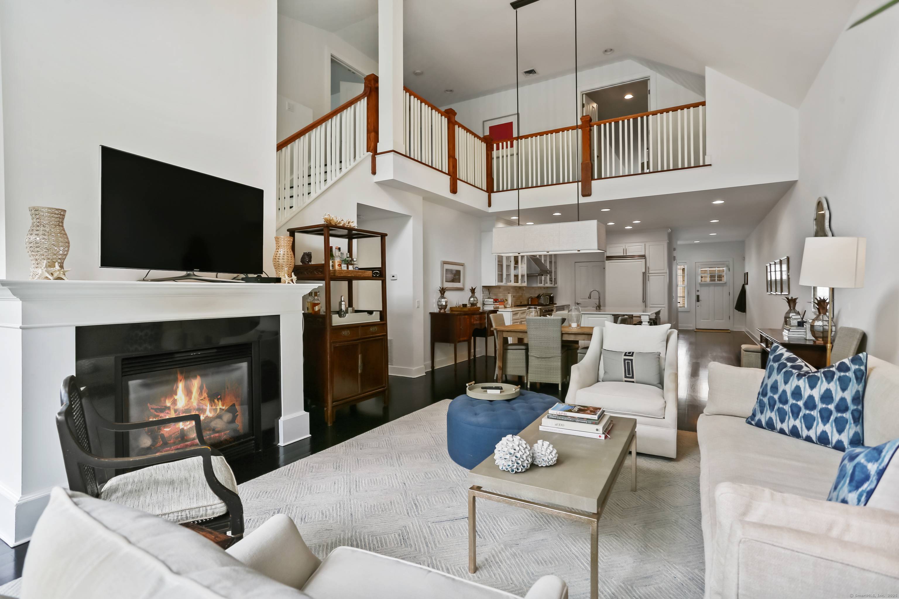 Welcome to this beautifully designed and immaculately maintained townhome in Palmer Hill a gated, award winning enclave ideally positioned on the Old Greenwich Stamford border.
