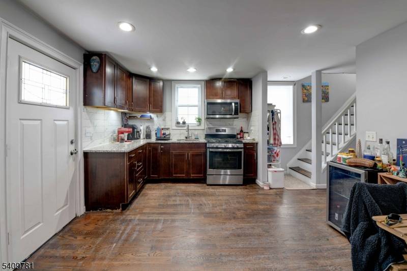 Welcome to this stunning one family home in the heart of Ironbound !