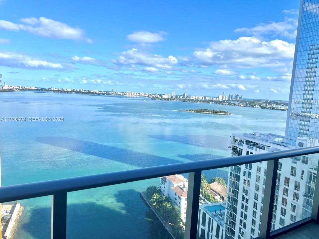 Unbeatable bay views in Edgewater from this fantastic residence featuring open concept living, a private elevator foyer entry ; split 2 bedroom, 2 bath layout, open kitchen with European cabinetry ...