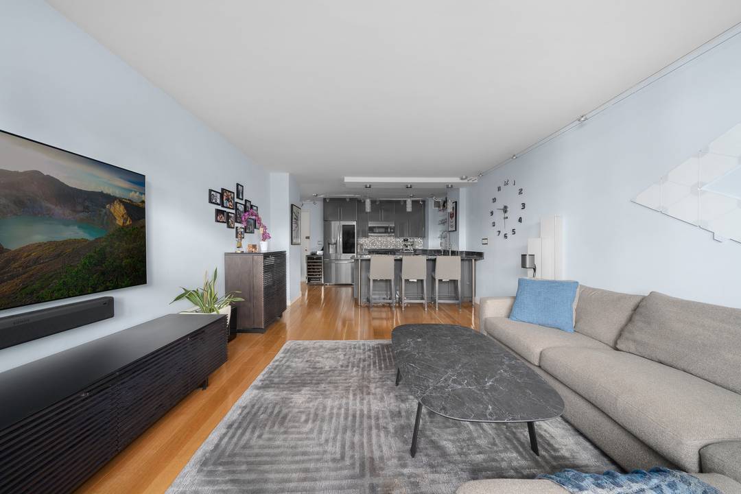 Welcome to this large one bedroom, one bathroom home offering modern design in a full service cooperative.