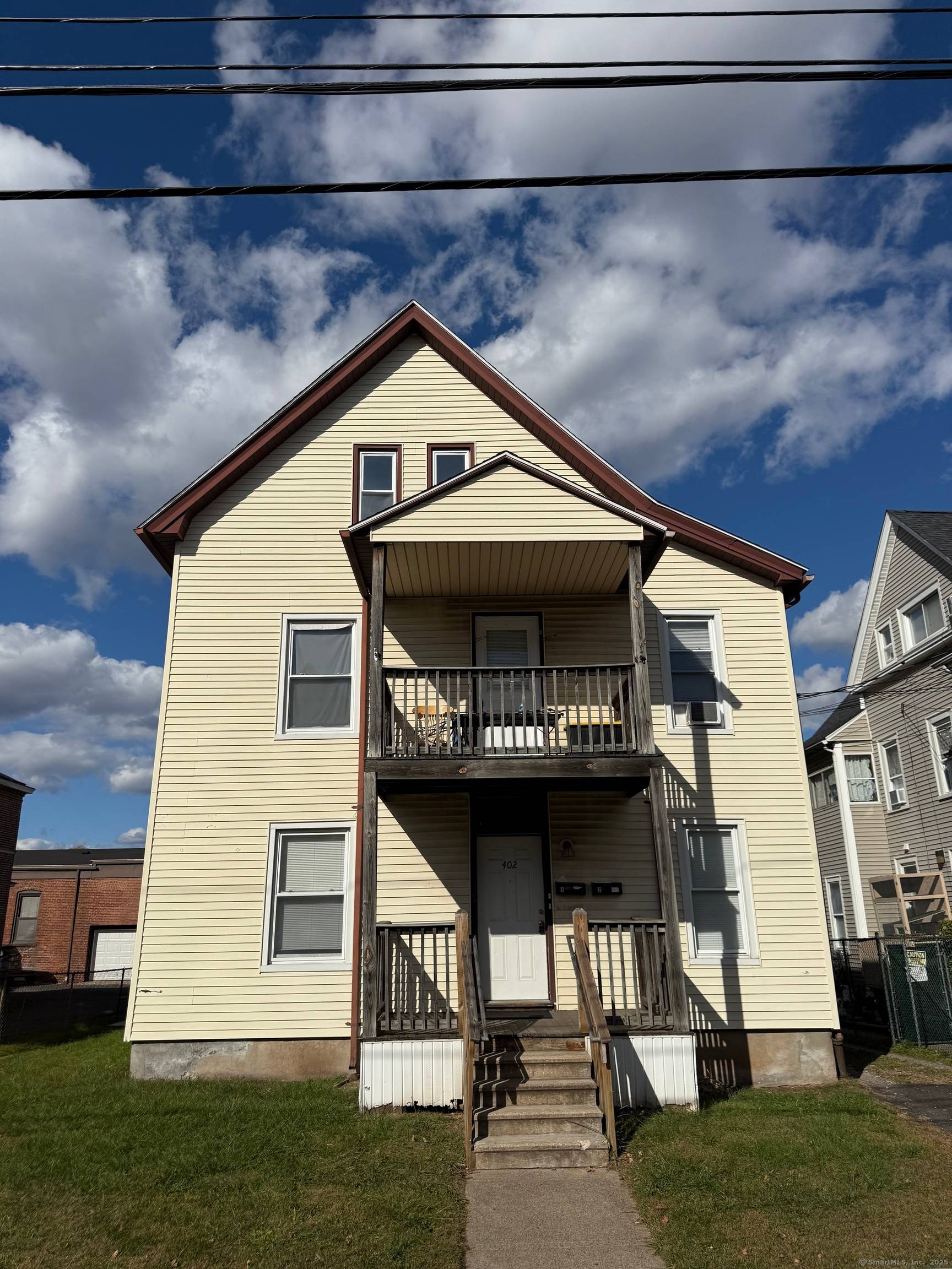 Beautifully updated two family Potentially Three Family with great income and future potential !