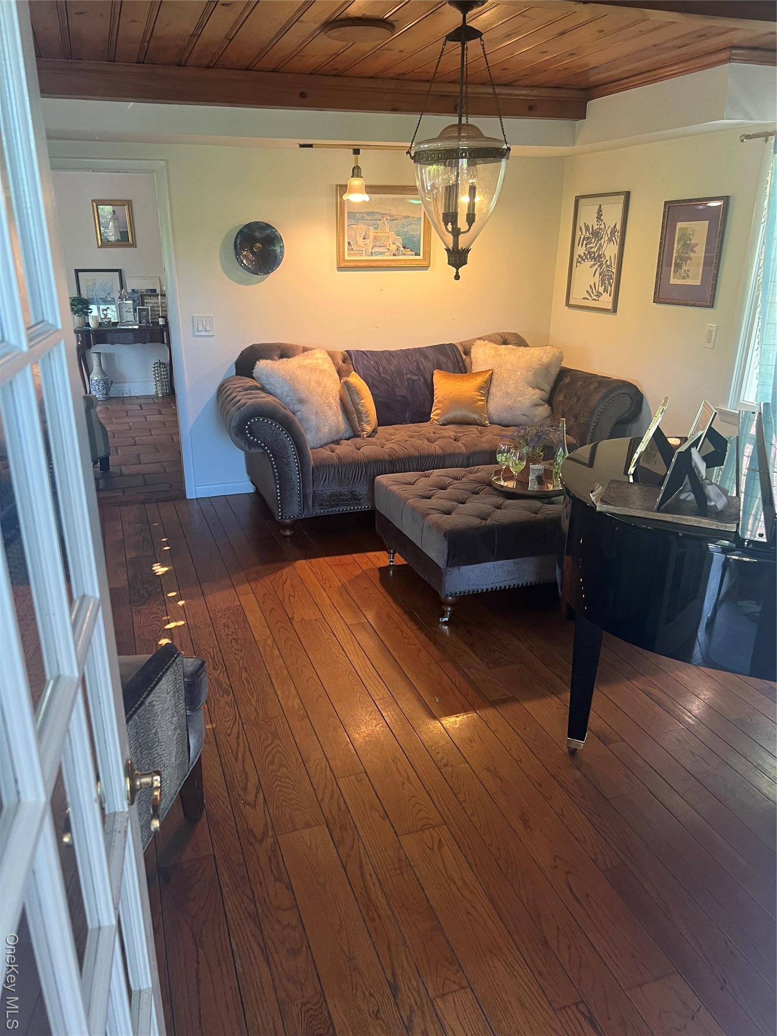 This fully furnished 4 bedroom colonial is located in Port Jefferson and offers sweeping views of the harbor.
