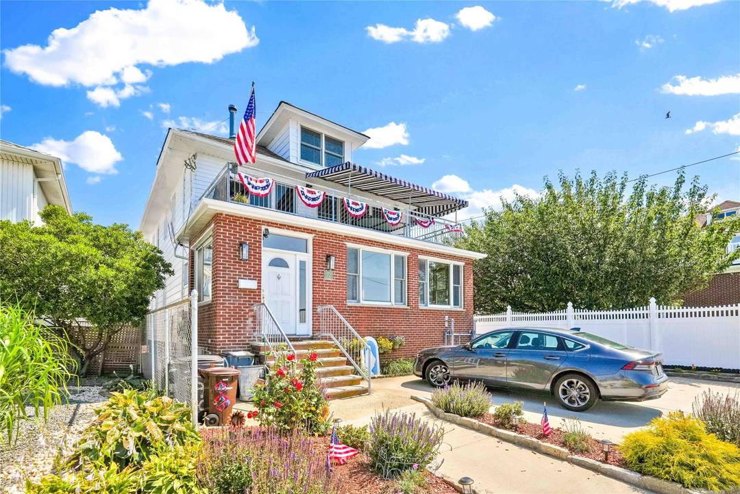 Welcome to this expansive and versatile three family residence nestled in the heart of Rockaway Beach.